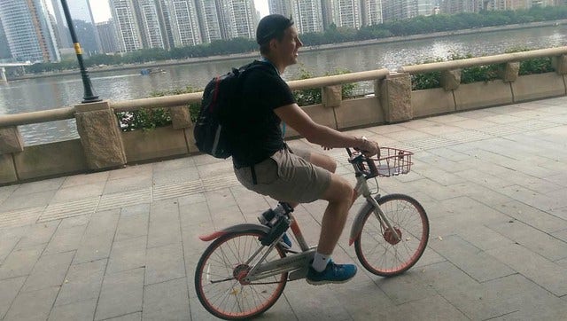Riding a Too small Mobike in Guangzhou